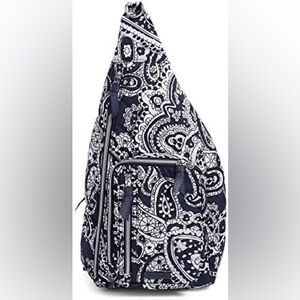 Vera Bradley sling backpack with wallet
